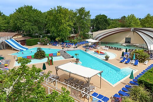 Buitenzwembad, waterglijbaan en kinderbad op camping CLICOCHIC Bimbo in BISCARROSSE (40).