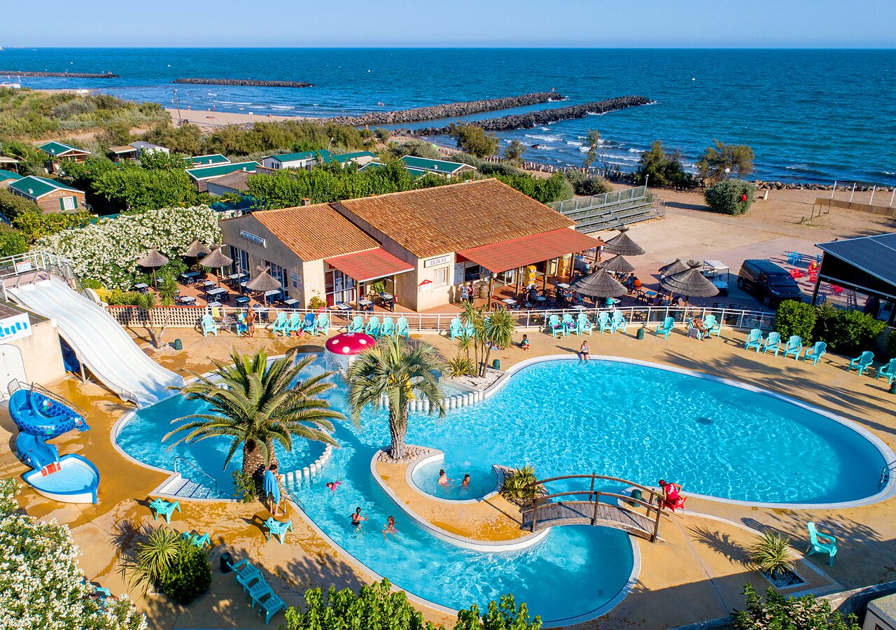 Zwembad, glijbaan, bar, strand op CAPFUN Flots Bleus VIAS PLAGE (34).