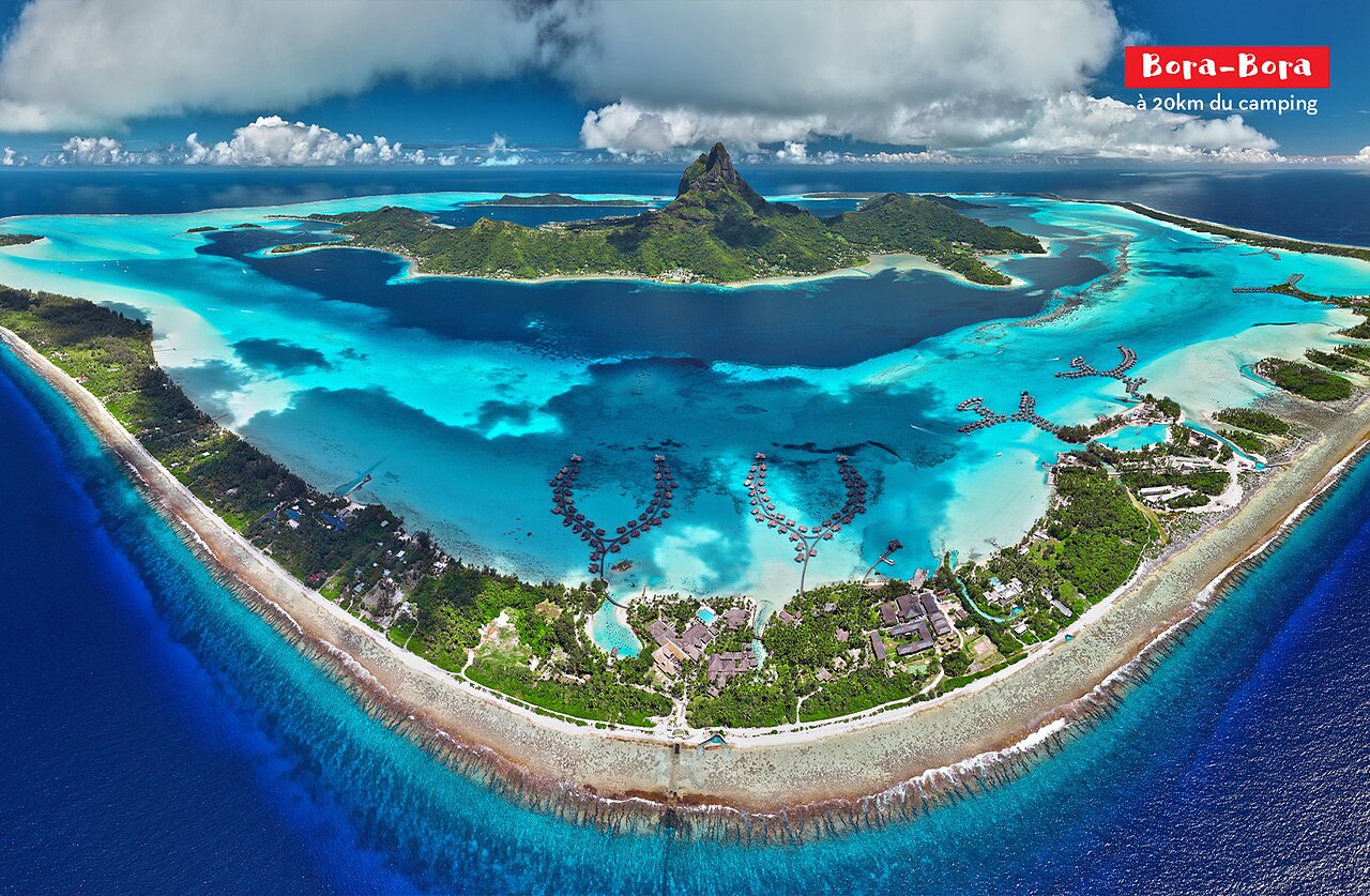 Bora-Bora, paradijselijk eiland met turquoise lagune en bungalows op palen te bezoeken.