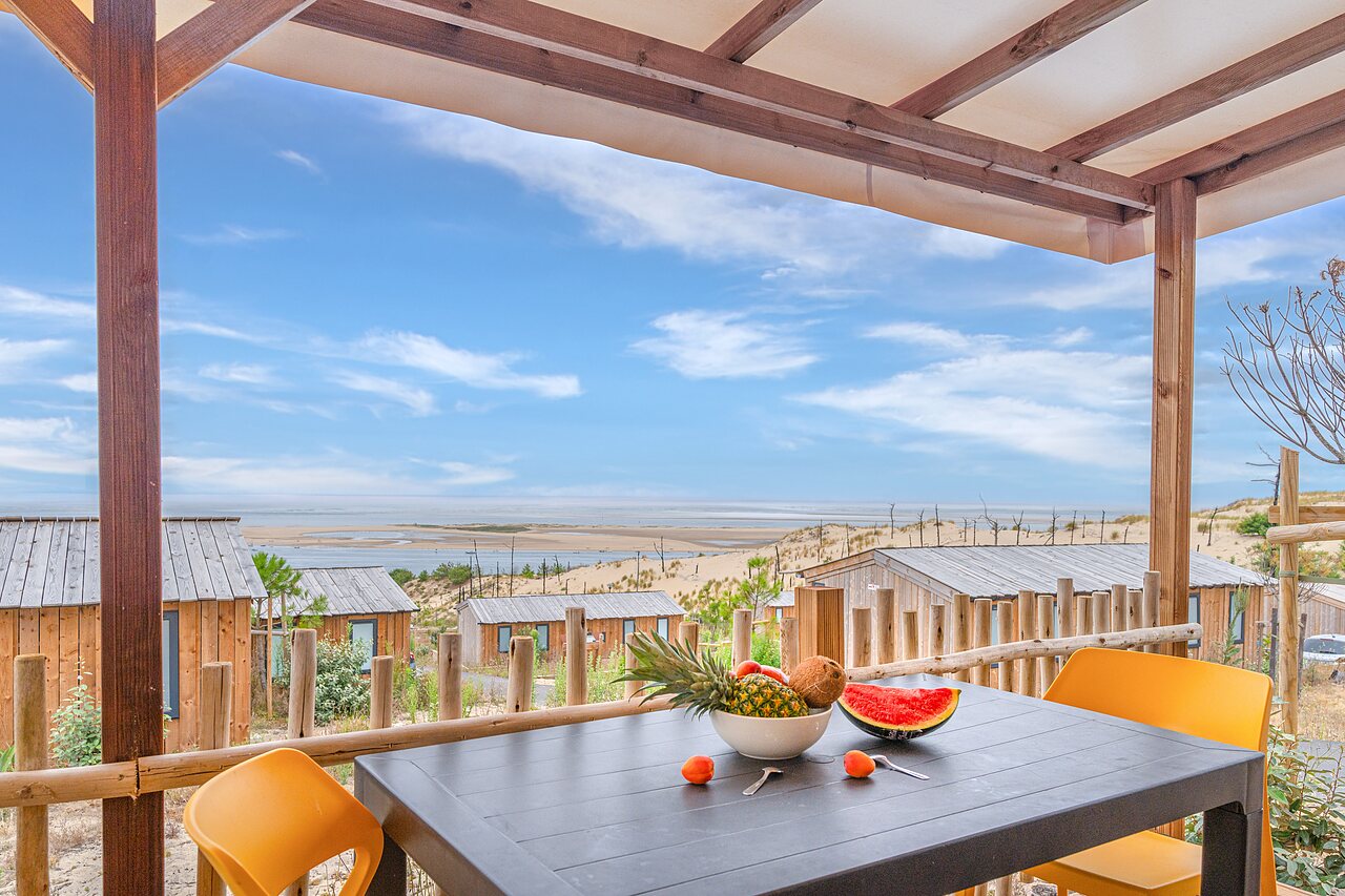 Terras stacaravan, zeezicht en duinen, camping CLICOCHIC Petit Nice, Pyla-sur-Mer.